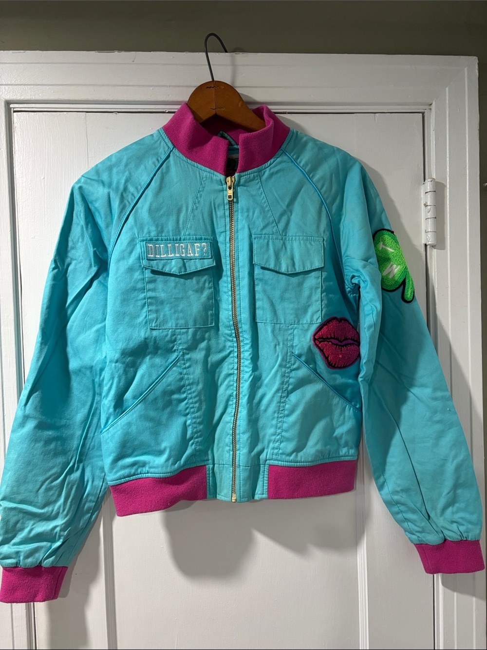MOB Turquoise Bomber Jacket with Pink Trim